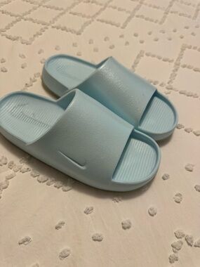 Nike womens Light Blue Slide Sandals